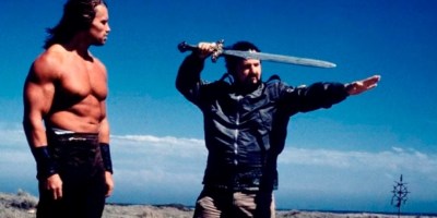 John Milius and Arnold Schwarzenegger behind the scenes Conan the Barbarian