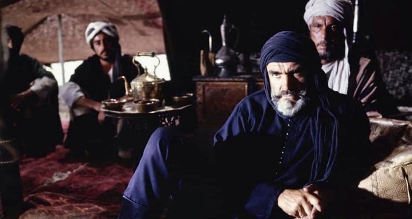 Sean Connery sitting in a tent in 1975 movie The Wind and the Lion