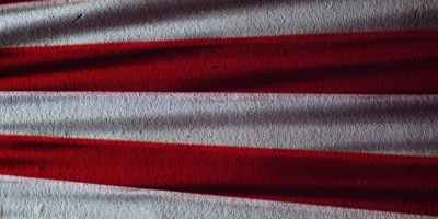 red and gray striped textile