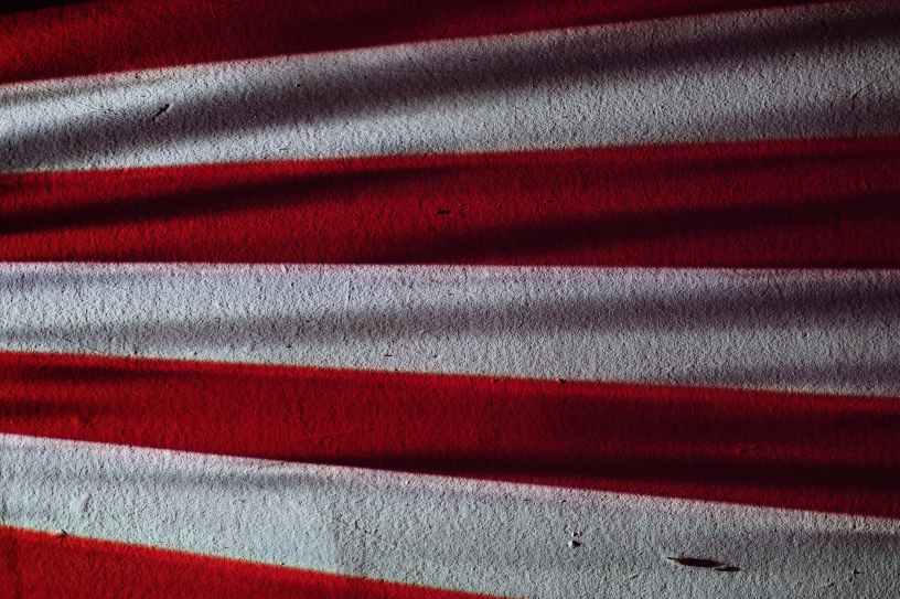 red and gray striped textile