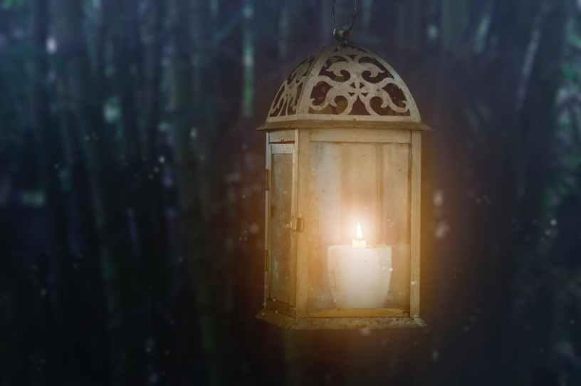 photo of brown candle lantern