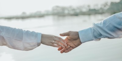 Couple holding hands. Photo Credit: Dwi Woro/Pexels