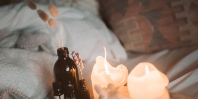 Taryn Elliott/Pexels. https://www.pexels.com/photo/lighted-candles-in-the-bedroom-4099356/
